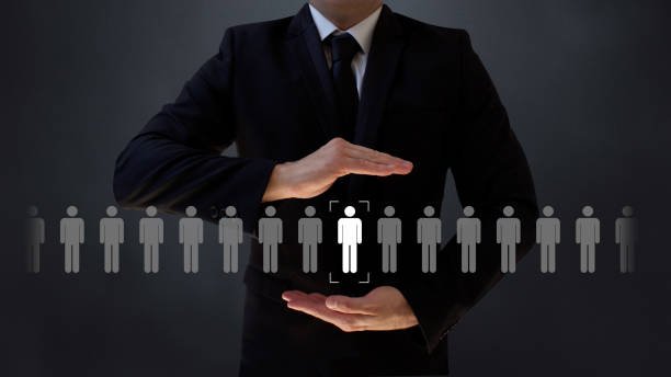 Businessman lifting a person among a group, symbolizing support and teamwork in improving Google rankings for USA Business Directories.