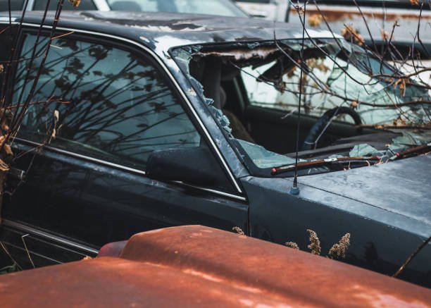A white car displayed, indicating a junk car for sale in Washington, DC.