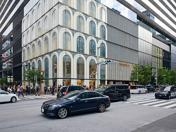 Nighttime view of parked cars along a street, emphasizing reliable rides by DJW Transportation in Phoenix, AZ.