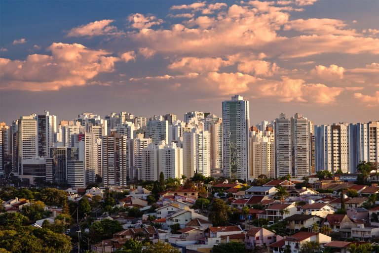 Captivating skyline of Londrina, Brazil with skyscrapers under a vibrant sunset sky.