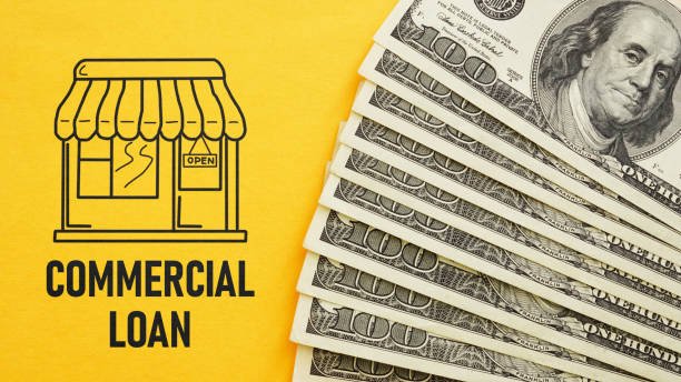 Commercial loan concept illustrated on a yellow background, promoting loans in Petersburg, VA for various property types.