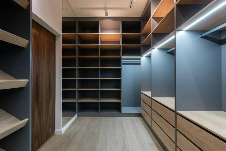 Luxury walk-in closet with custom storage and organization