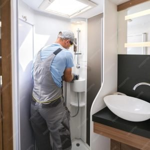 imgi_40_handyman-fixing-motorhome-shower_1426-23791