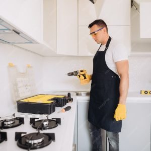 imgi_52_maintenance-man-installing-kitchen-furniture_8544-1363